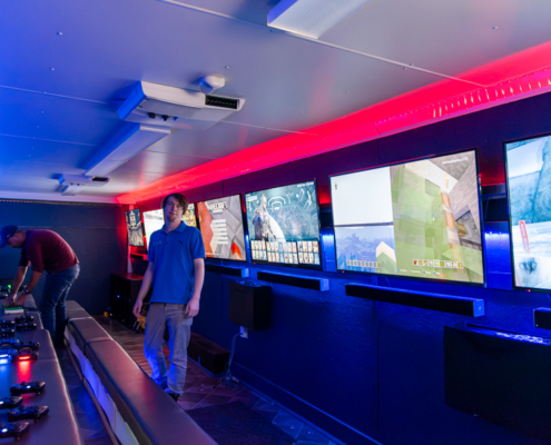 Game Coaches preparing the mobile gaming trailer before a video game party